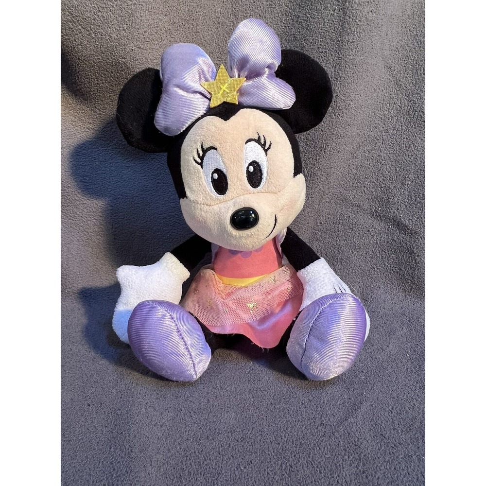 Disney Junior Minnie Mouse Stars In A Pink Dress With A Purple Bow
